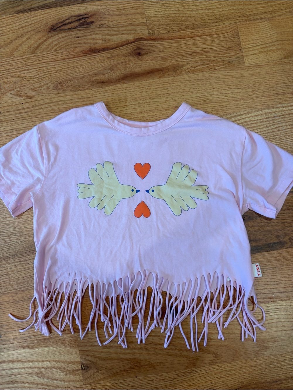 Girls Pink Fringe Tee with Dove & Heart Graphic